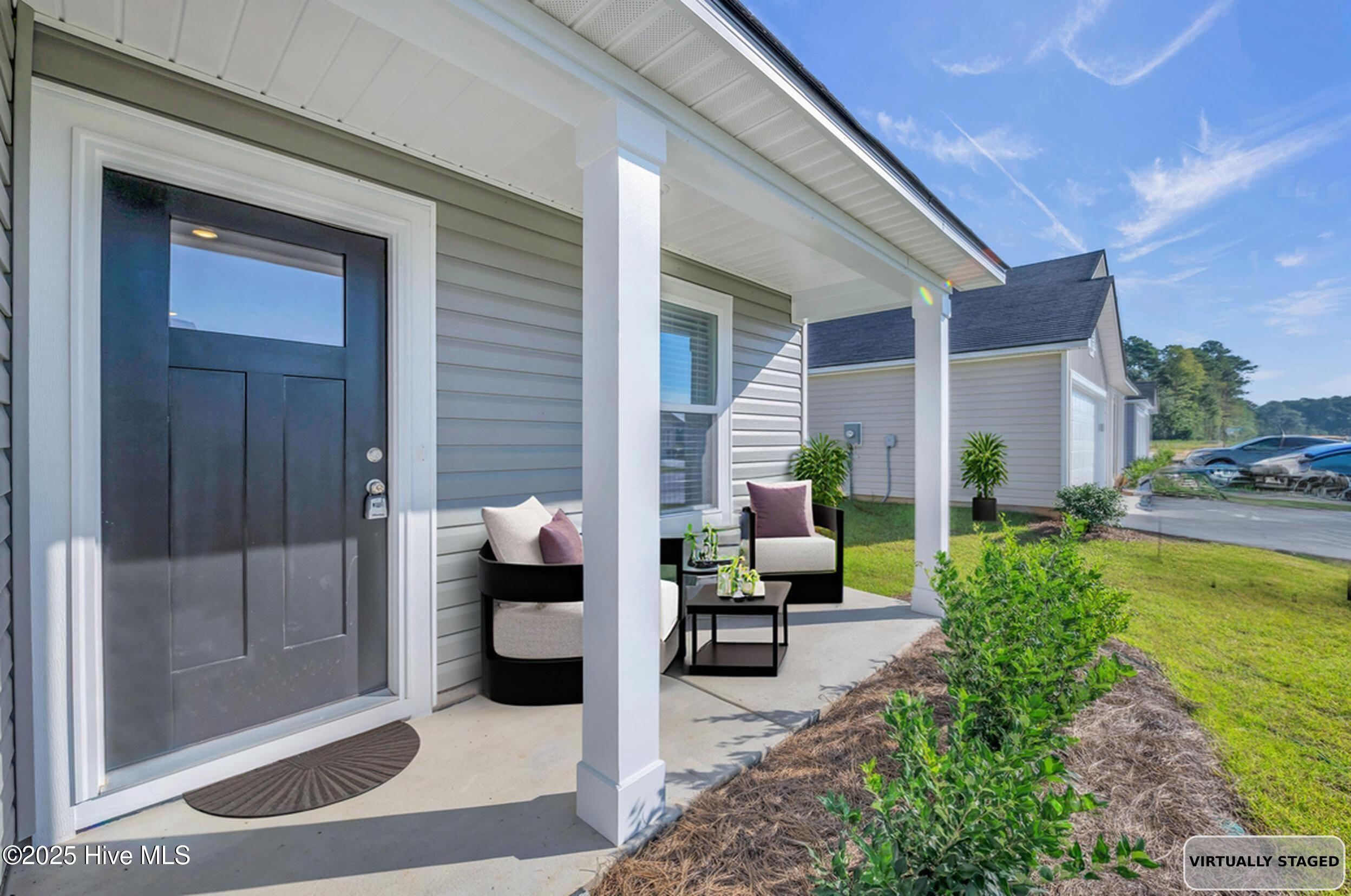 6359 Swainson Street Southwest Ocean Isle Beach, NC 28469 - Photo 2 of 31 Virtual front porch