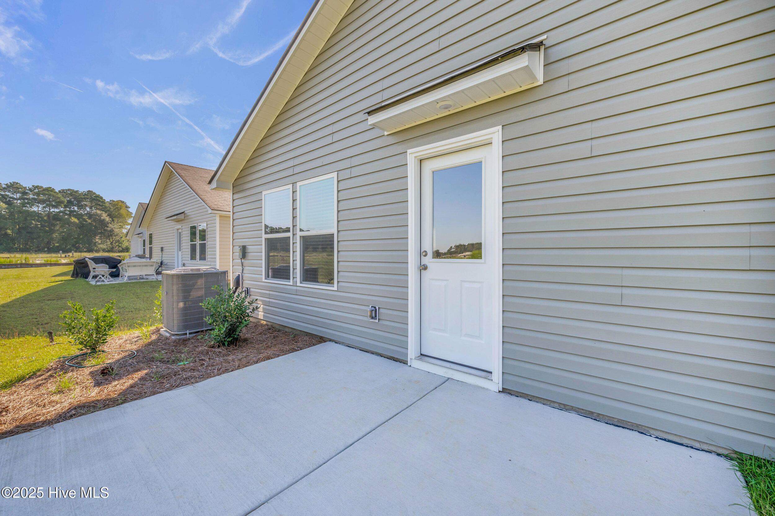 6359 Swainson Street Southwest Ocean Isle Beach, NC 28469 - Photo 24 of 31 Back Patio