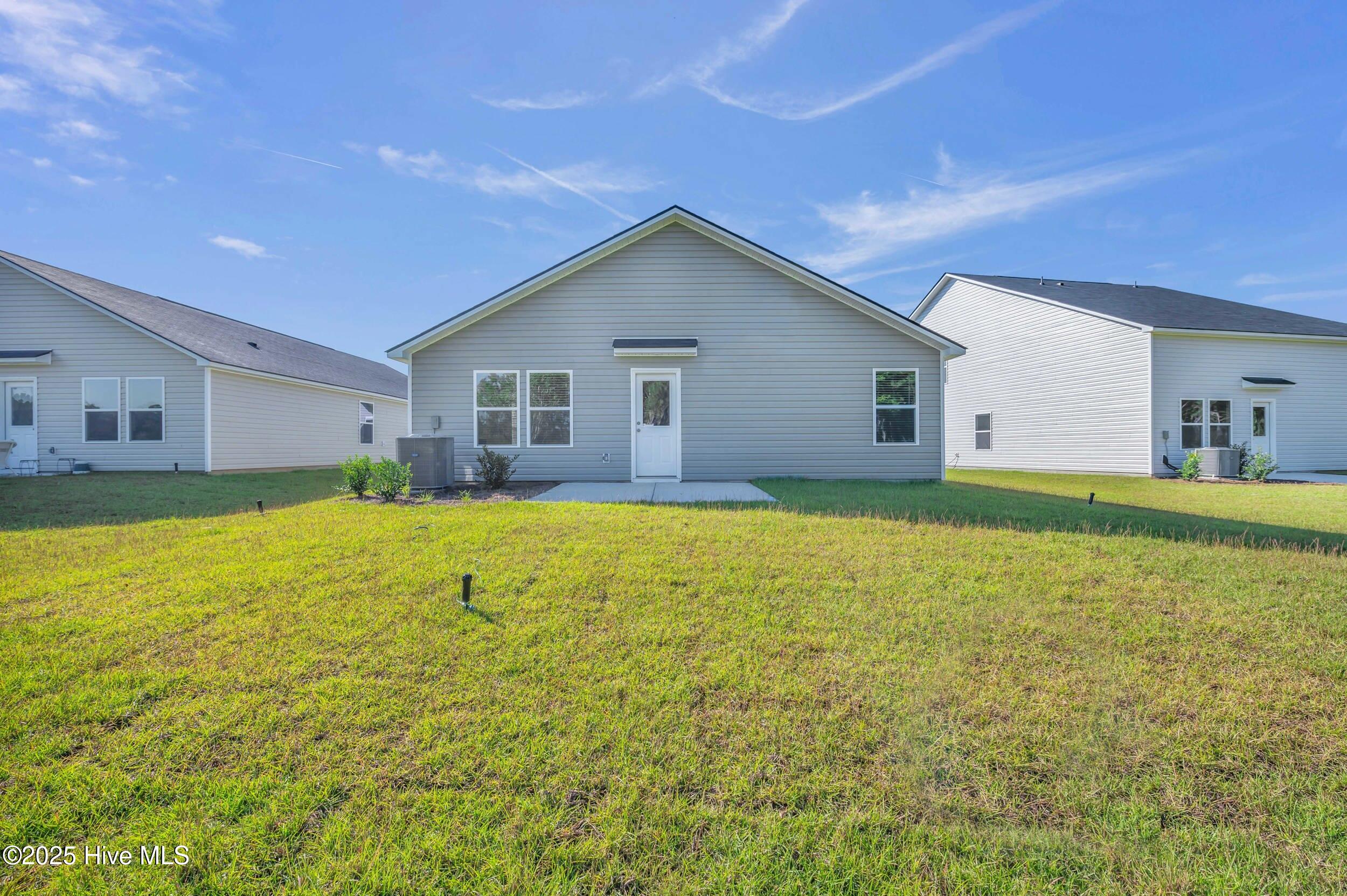 6359 Swainson Street Southwest Ocean Isle Beach, NC 28469 - Photo 25 of 31 Back yard