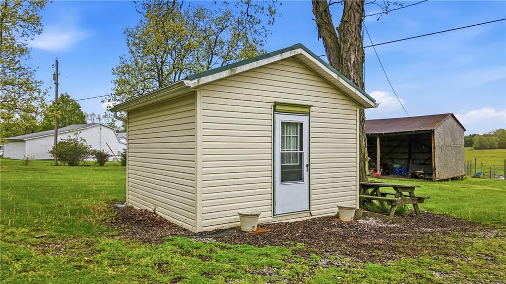 122 Coal Bank Road Greenville, PA 16125 - Photo 6 of 50 a view of a house with a yard