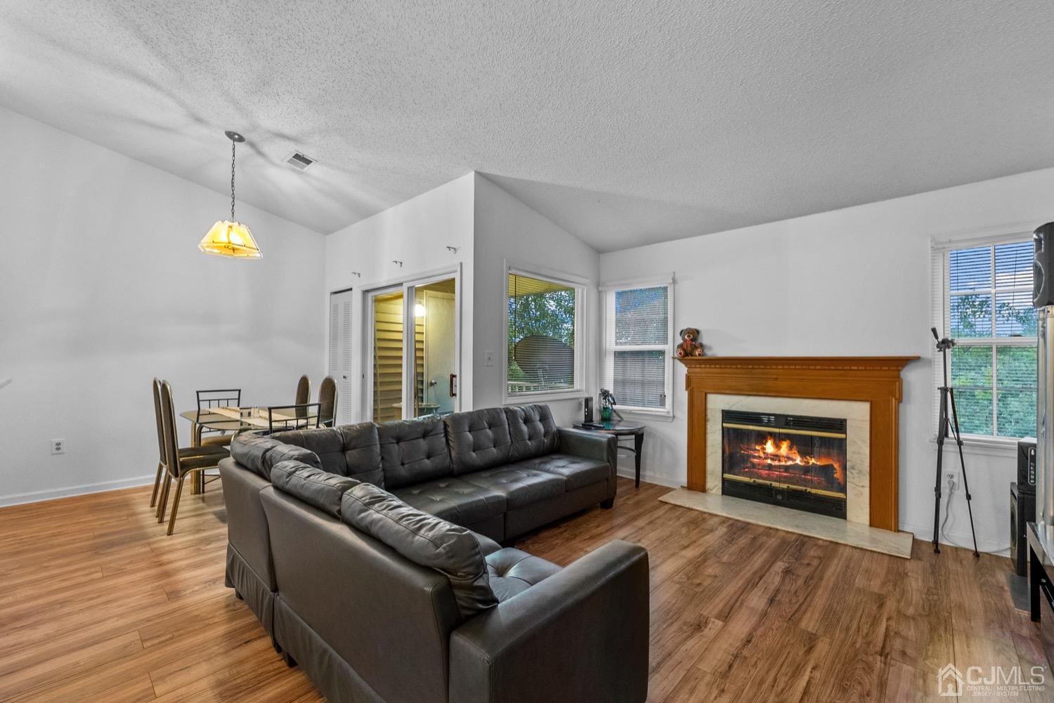 1237 Edpas Road New Brunswick, NJ 08901 - Photo 4 of 21 a living room with furniture and a fireplace