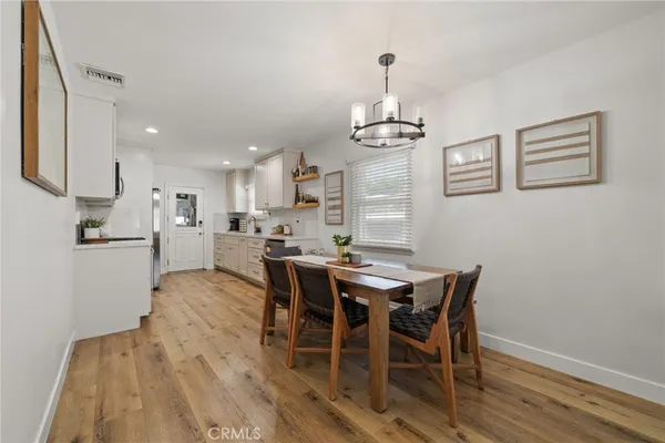 a view of a dining room with furniture