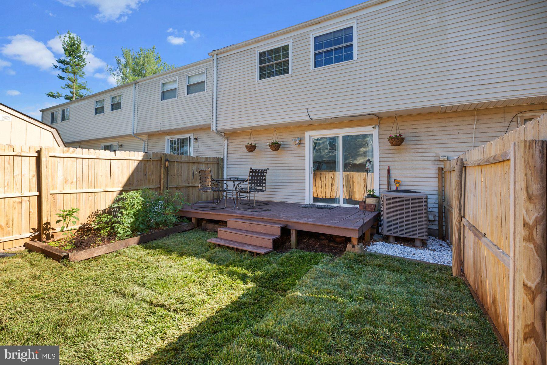 17660 Kohlhoss Road Poolesville, MD 20837 - Photo 22 of 22 a house view with a garden space