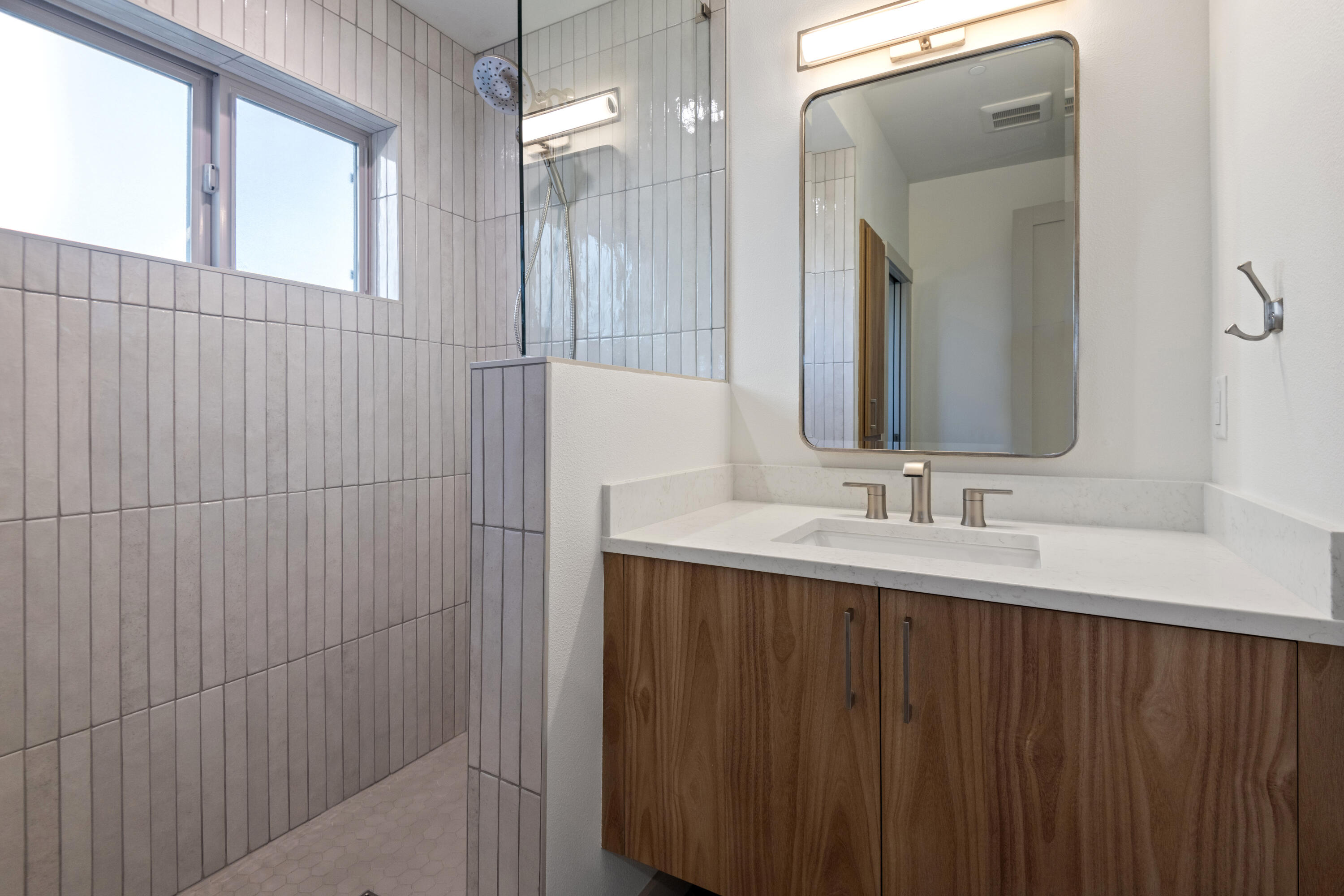 680 Southwest Otter Way Bend, OR 97702 - Photo 25 of 48 a bathroom with a double vanity sink and a mirror