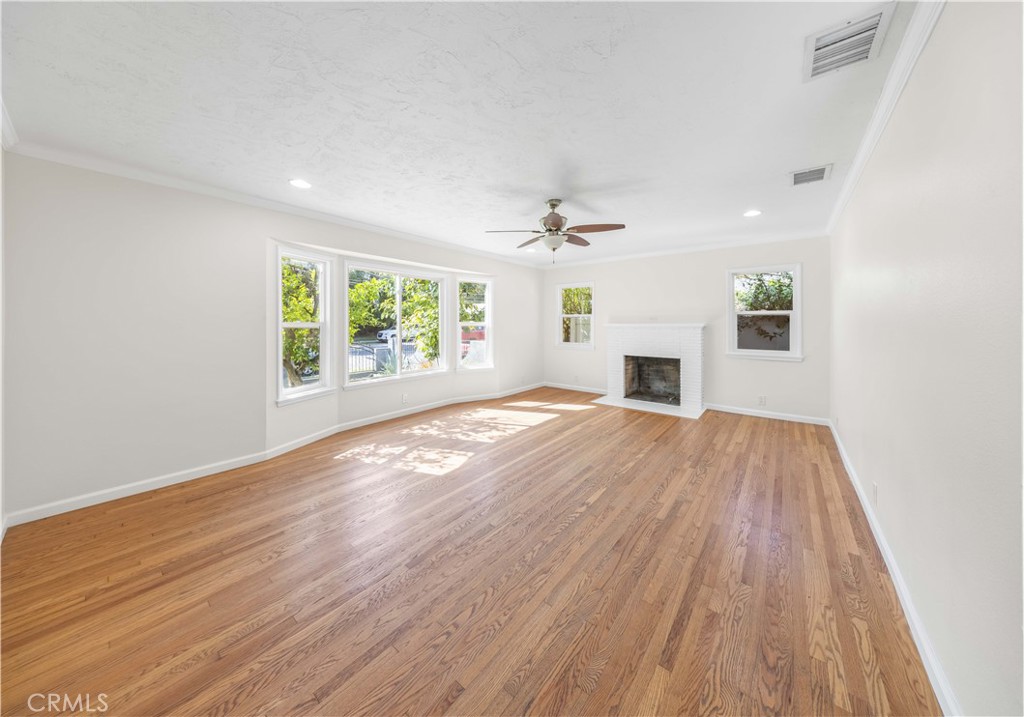 2074 Summit Avenue Pasadena, CA 91103 - Photo 1 of 23 wooden floor in an empty room with a window