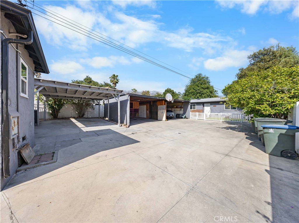 2074 Summit Avenue Pasadena, CA 91103 - Photo 16 of 23 a view of a house with a backyard