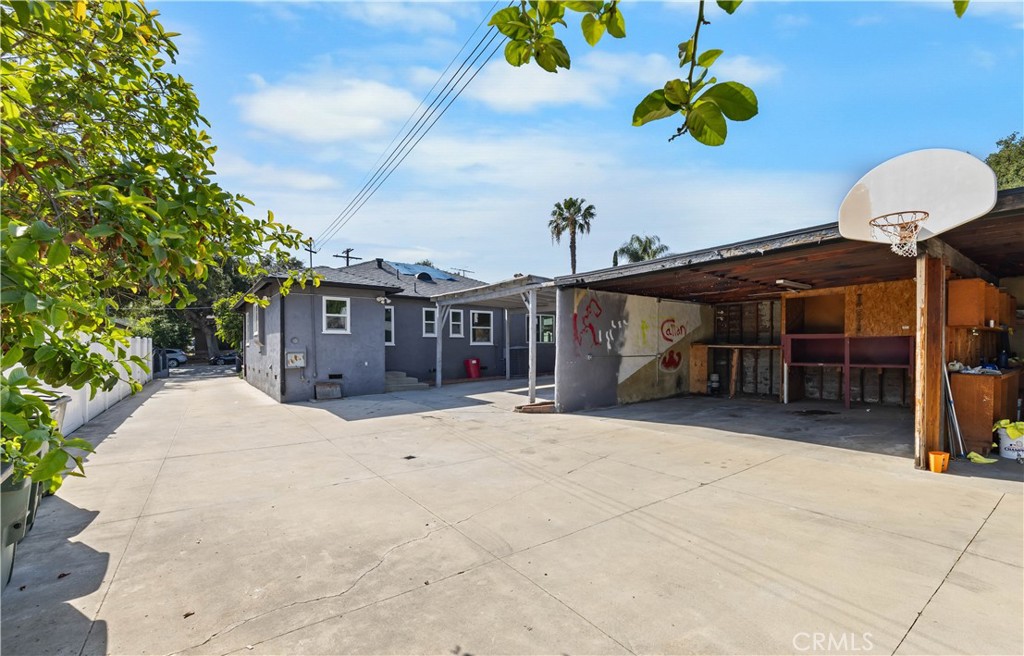 2074 Summit Avenue Pasadena, CA 91103 - Photo 17 of 23 a front view of a house with a yard