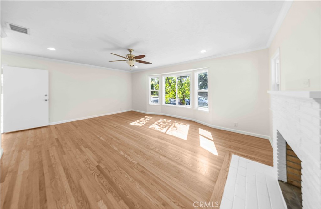 2074 Summit Avenue Pasadena, CA 91103 - Photo 3 of 23 wooden floor in an empty room with a window