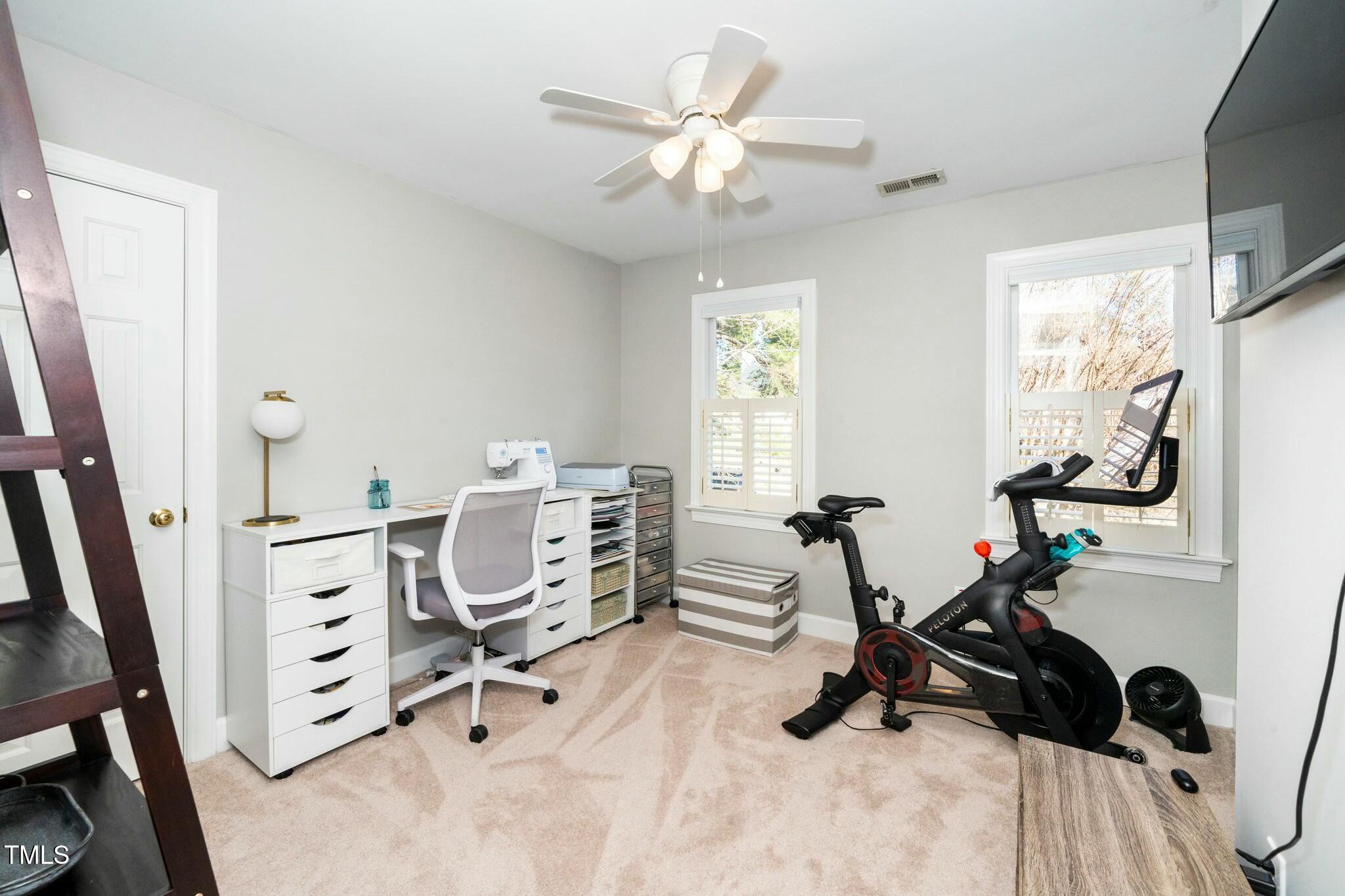 2400 Dahlgreen Road Raleigh, NC 27615 - Photo 21 of 36 a view of a workspace with furniture and a window