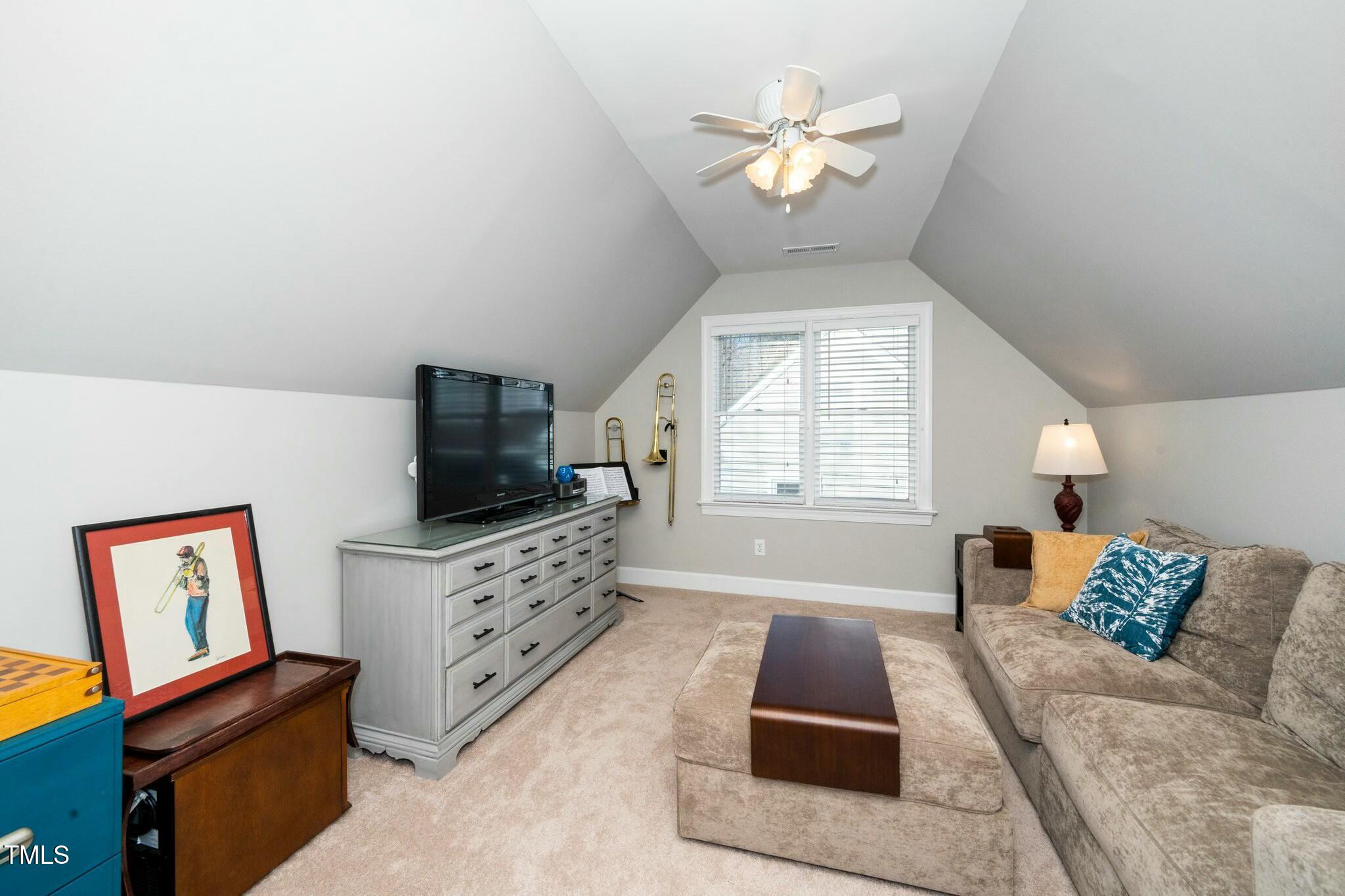 2400 Dahlgreen Road Raleigh, NC 27615 - Photo 23 of 36 a living room with furniture and a flat screen tv