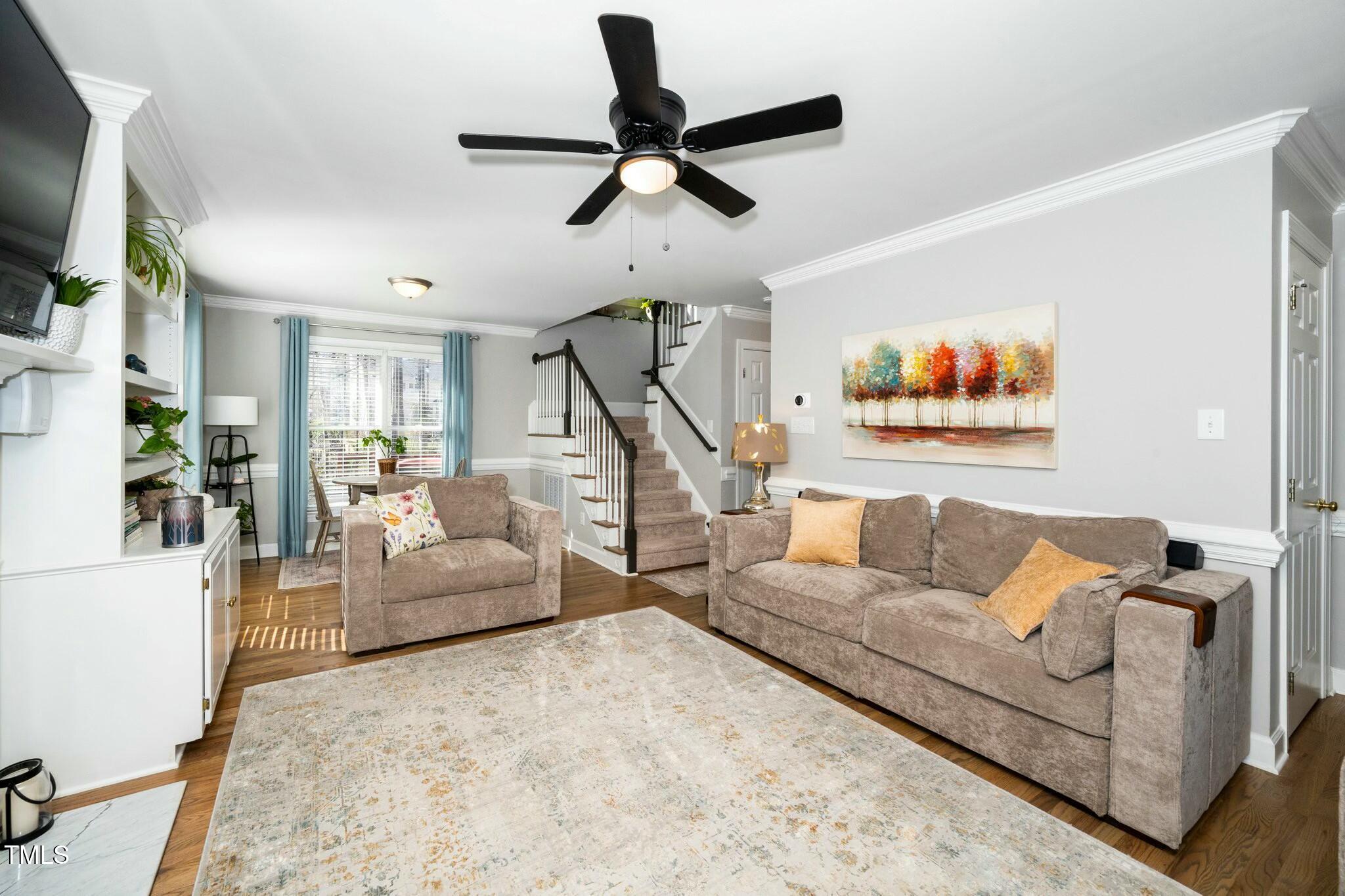 2400 Dahlgreen Road Raleigh, NC 27615 - Photo 8 of 36 a living room with furniture and a flat screen tv