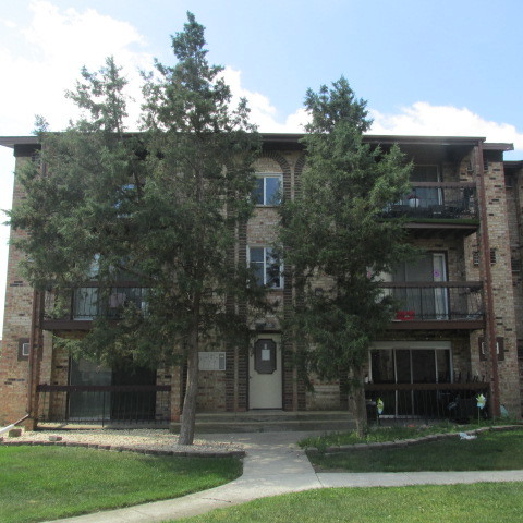 15830 Orlan Brook Drive, Unit 2B Orland Park, IL 60462 - Photo 1 of 1 a front view of house with yard