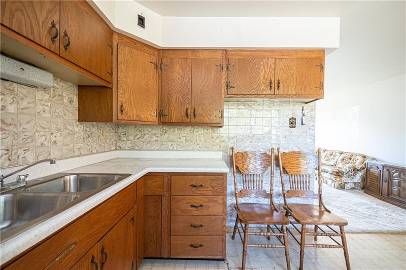 103 Louis Drive McKees Rocks, PA 15136 - Photo 8 of 24 Kitchen with view of stainless sink and counter space.