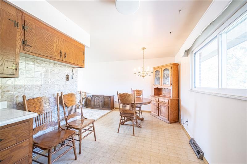 103 Louis Drive McKees Rocks, PA 15136 - Photo 9 of 24 Eat-in kitchen with view of living room.