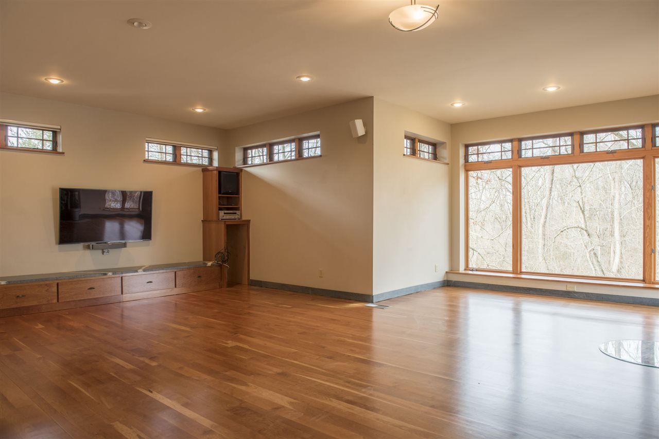 501 East Riverside Drive Bridgewater, VA 22812 - Photo 7 of 48 with cherry floors, soapstone detail, and flat screen TV