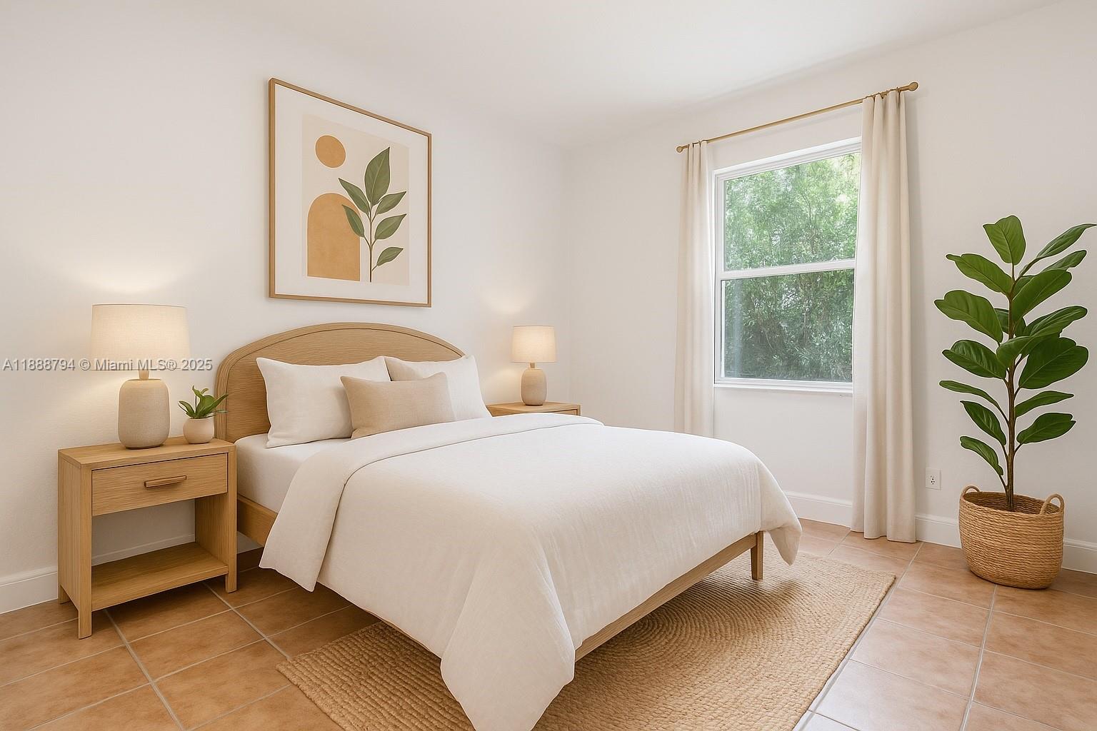 2791 Southwest 190th Avenue Miramar, FL 33029 - Photo 16 of 41 a bedroom with bed and a potted plant