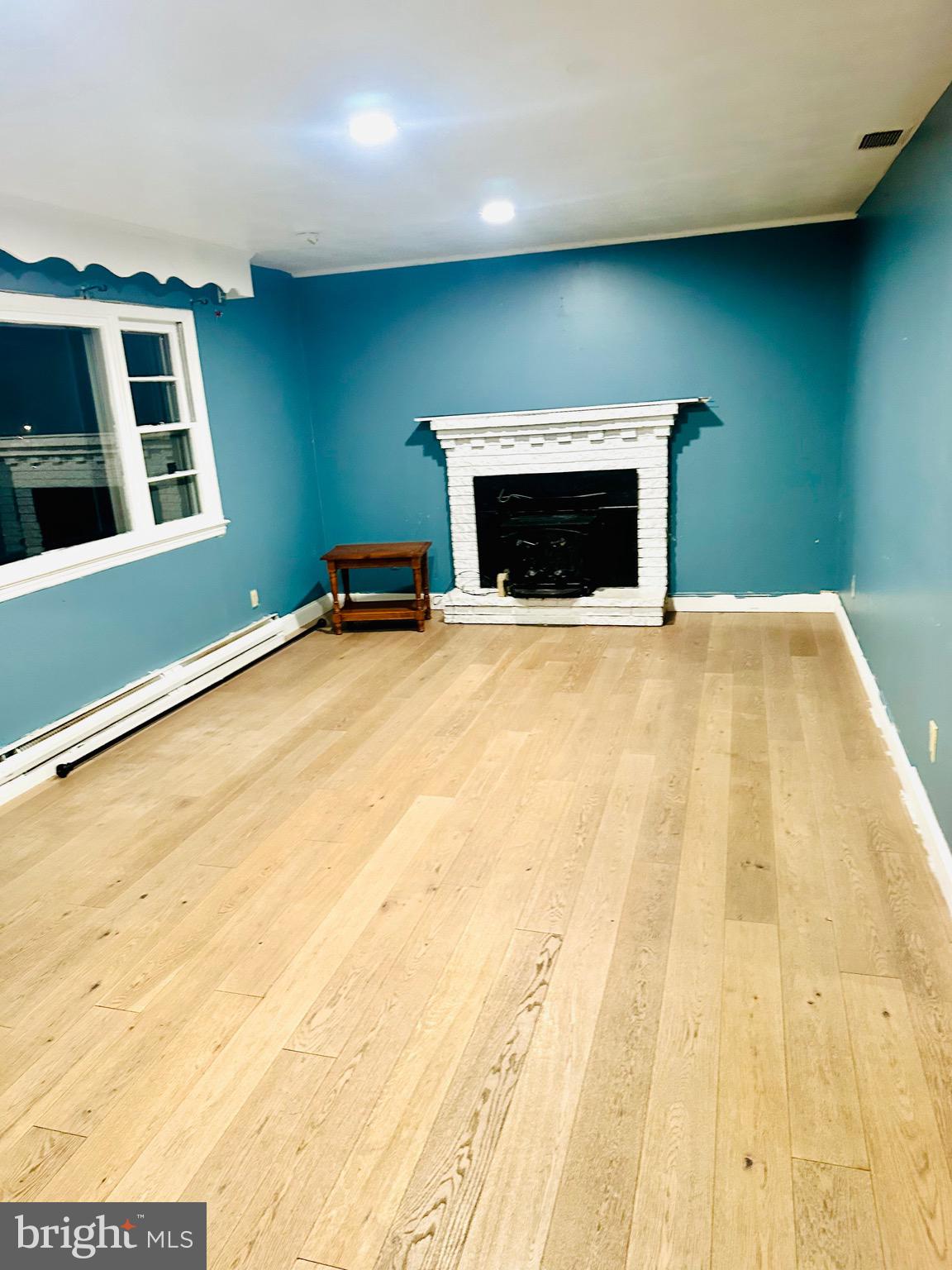 323 Russelcroft Road Winchester, VA 22601 - Photo 21 of 40 a room with a fireplace