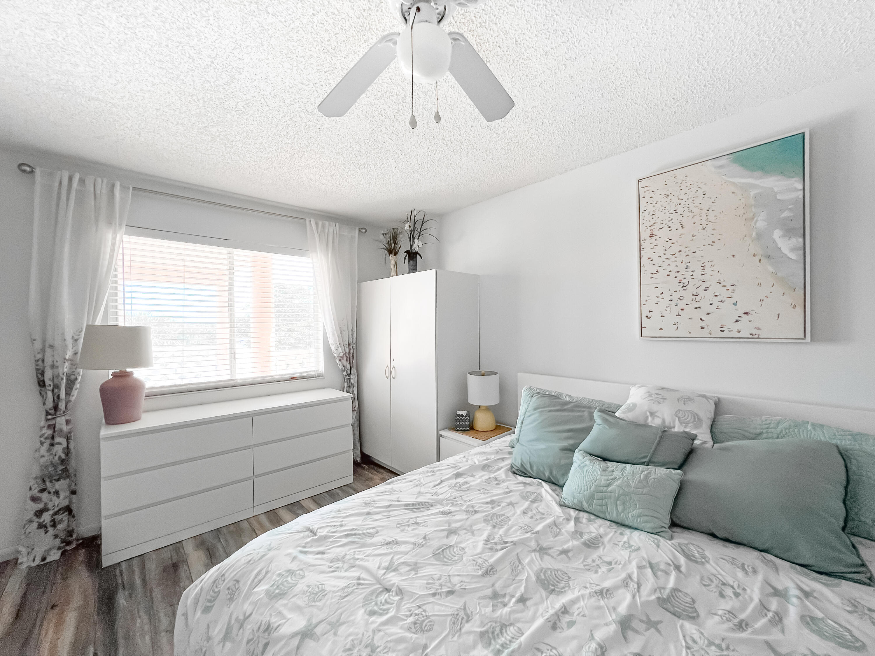 353 Highway 1, Unit B309 Jupiter, FL 33477 - Photo 14 of 24 a bedroom with a bed and a window