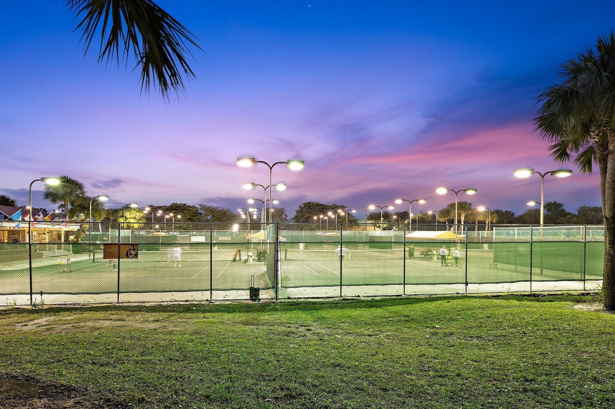 353 Highway 1, Unit B309 Jupiter, FL 33477 - Photo 20 of 24 a view of a golf course with a lake