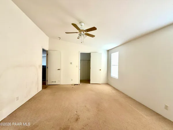 a view of a big room with carpet