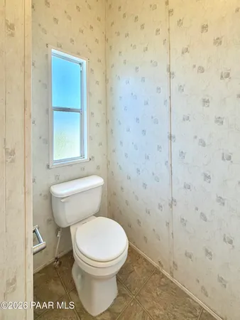 a view of a hallway with a white walls