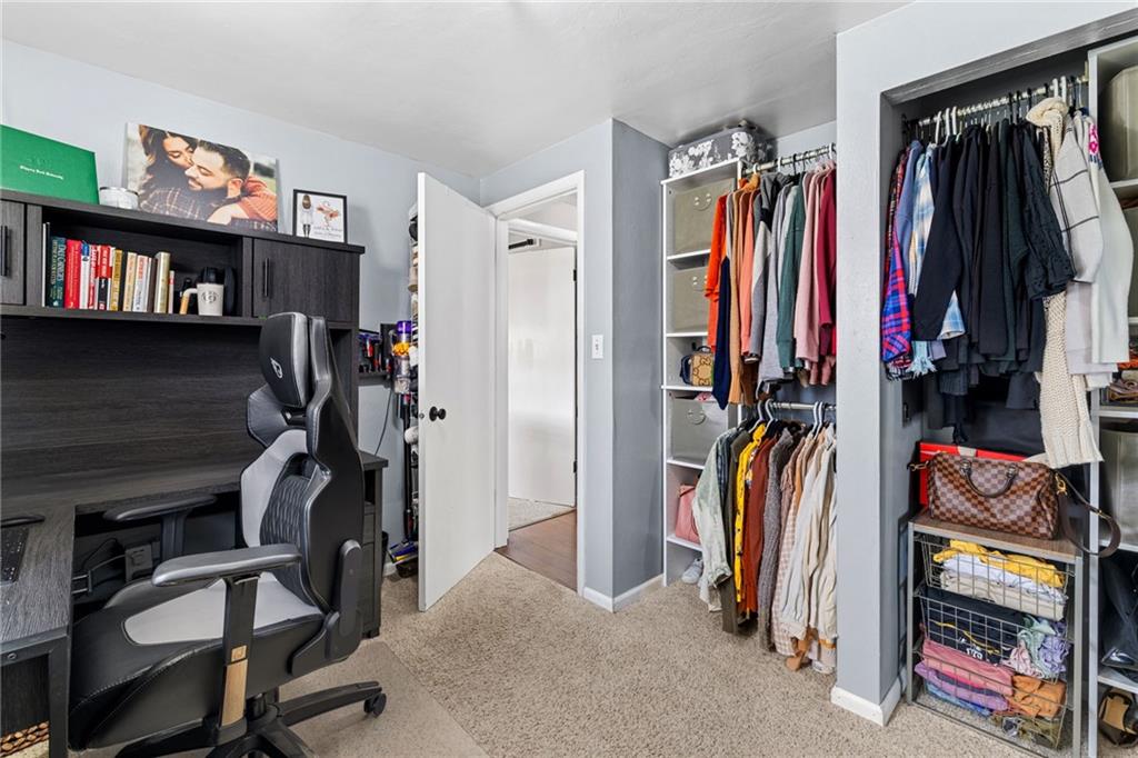 1075 Fiddleback Drive McKees Rocks, PA 15136 - Photo 19 of 34 a view of walk in closet with clothes and shoes