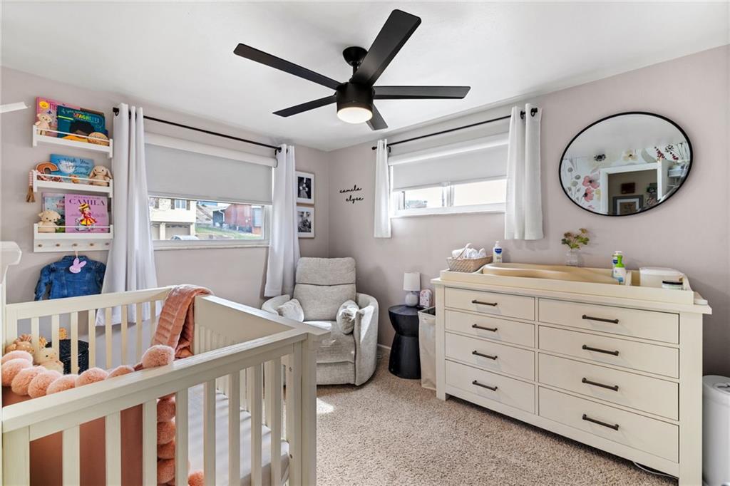 1075 Fiddleback Drive McKees Rocks, PA 15136 - Photo 20 of 34 a room with a baby bed baby crib and a window