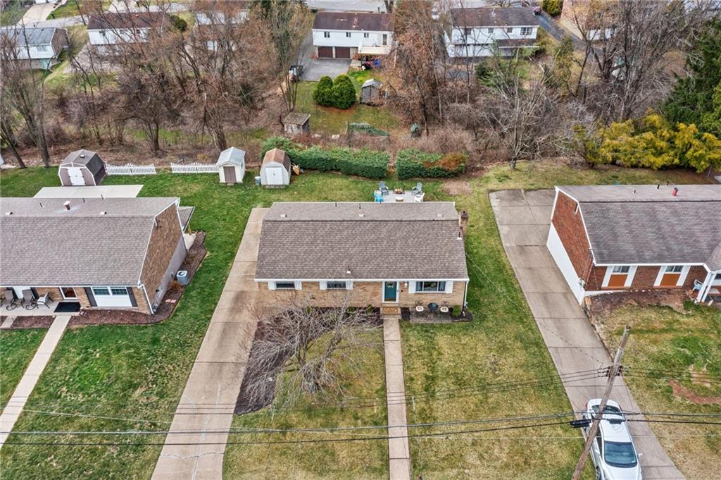 1075 Fiddleback Drive McKees Rocks, PA 15136 - Photo 30 of 34 an aerial view of a house with garden space and street view