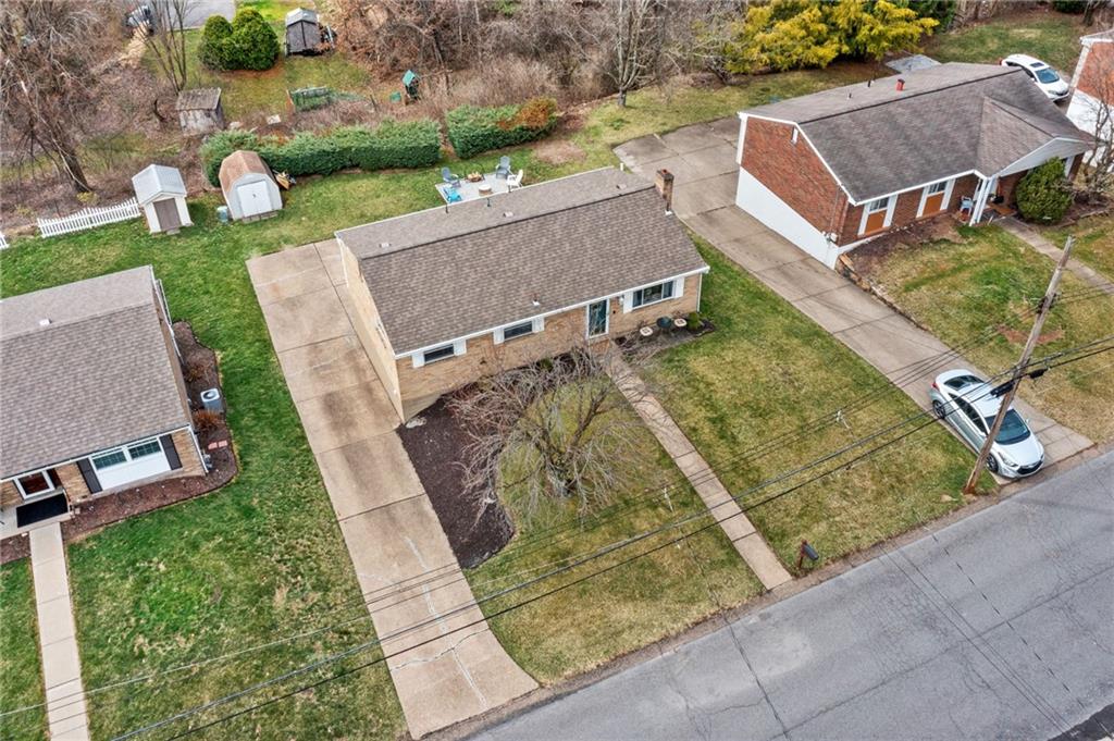 1075 Fiddleback Drive McKees Rocks, PA 15136 - Photo 31 of 34 an aerial view of a house with garden space and street view