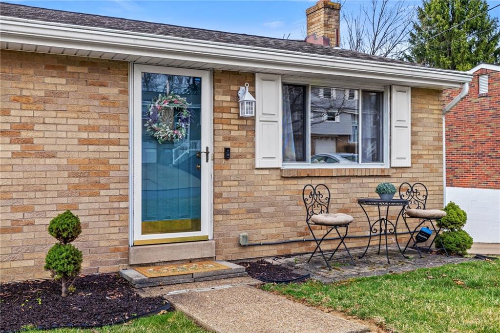 1075 Fiddleback Drive McKees Rocks, PA 15136 - Photo 4 of 34 a view of a house with a yard and sitting area