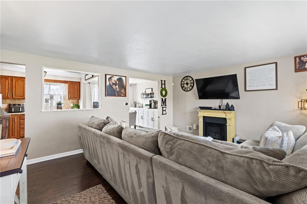 1075 Fiddleback Drive McKees Rocks, PA 15136 - Photo 5 of 34 a living room with furniture and a fireplace