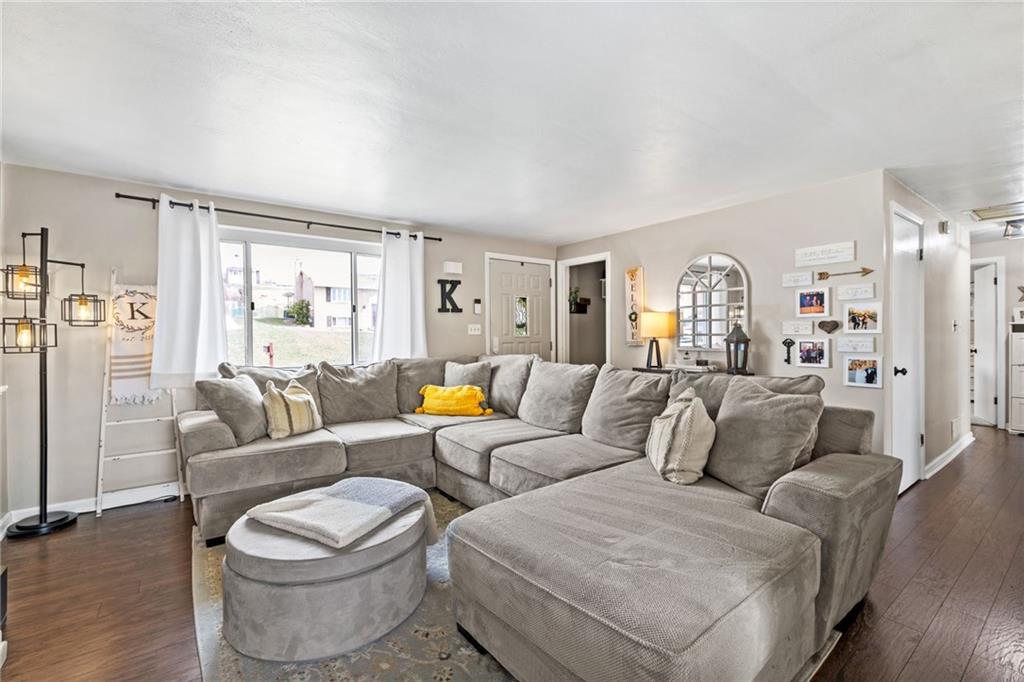 1075 Fiddleback Drive McKees Rocks, PA 15136 - Photo 8 of 34 a living room with furniture and a large window