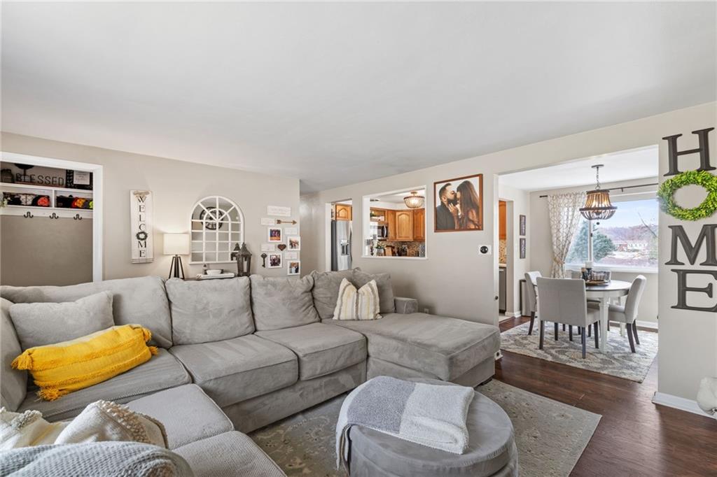 1075 Fiddleback Drive McKees Rocks, PA 15136 - Photo 9 of 34 a living room with furniture and wooden floor