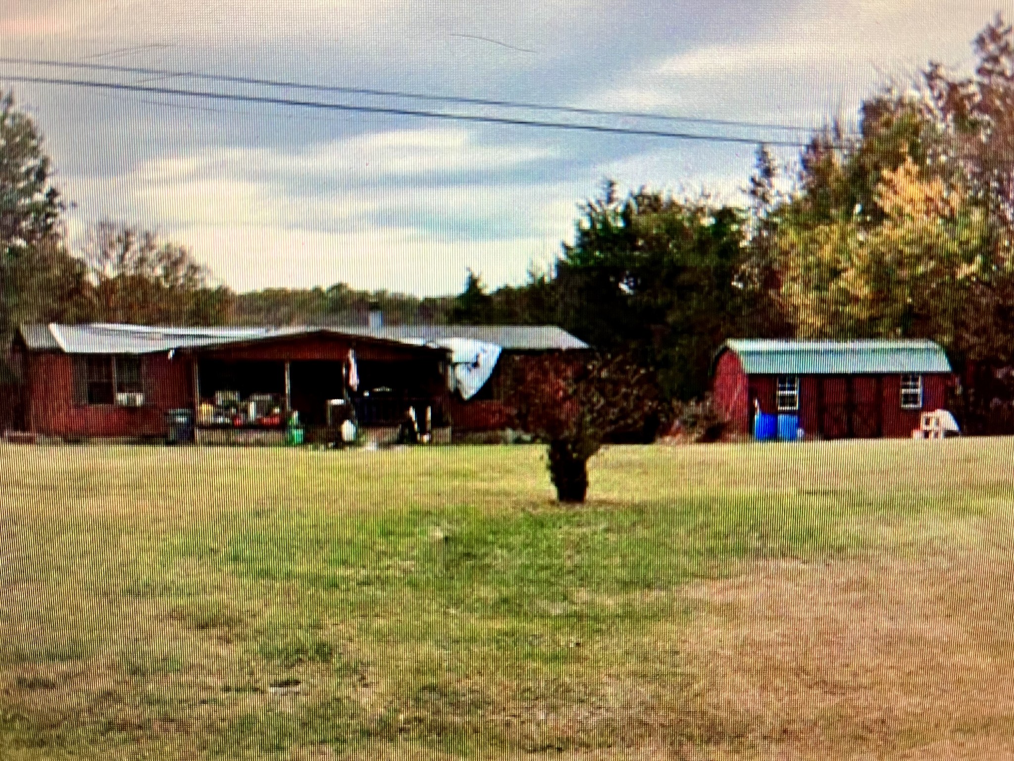 1250 St Johns Road Lascassas, TN 37085 - Photo 1 of 1 a view of a house with a yard