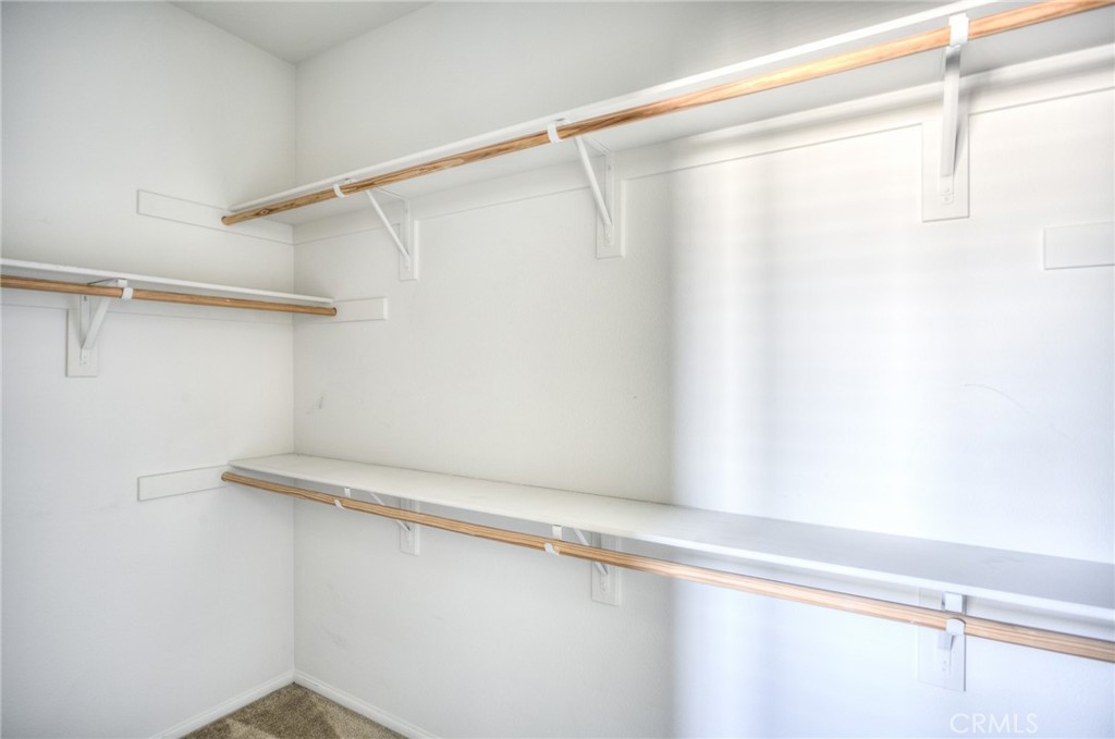 16001 Chase Road, Unit 53 Fontana, CA 92336 - Photo 21 of 32 a close up view of racks on the wall