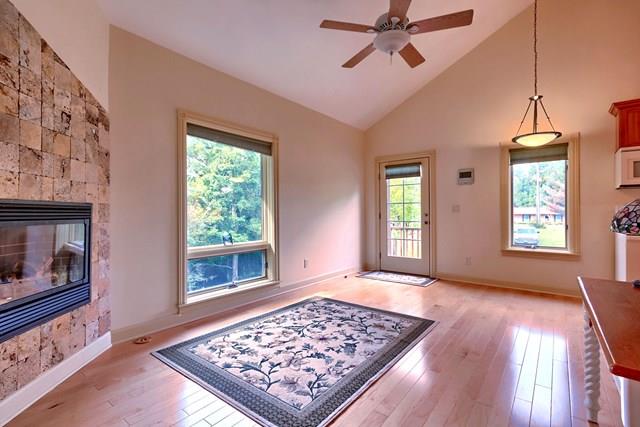 892 Cunningham Lane Baxter, TN 38544 - Photo 16 of 28 a view of an empty room with window and wooden floor