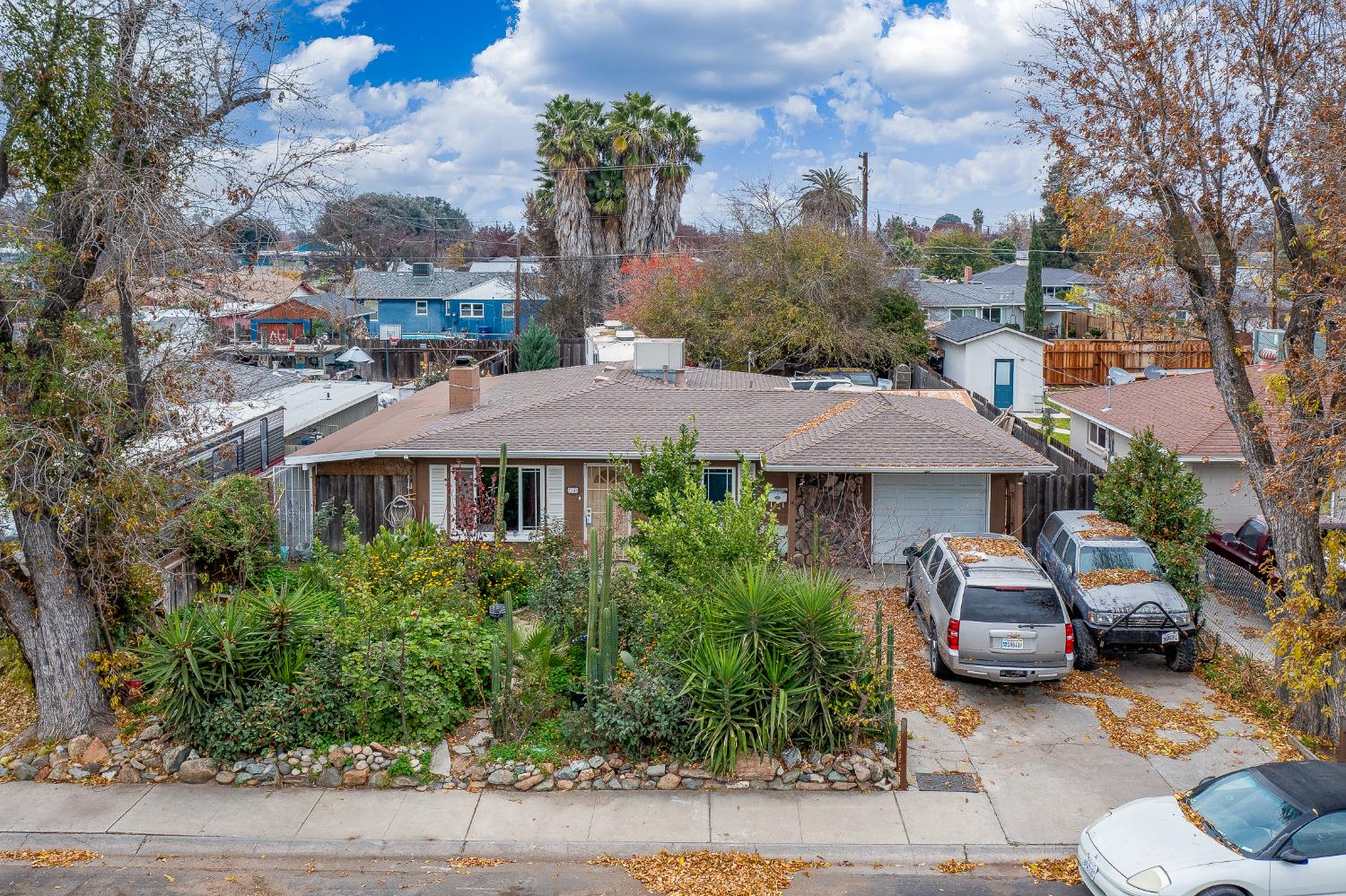 a front view of a house with garden