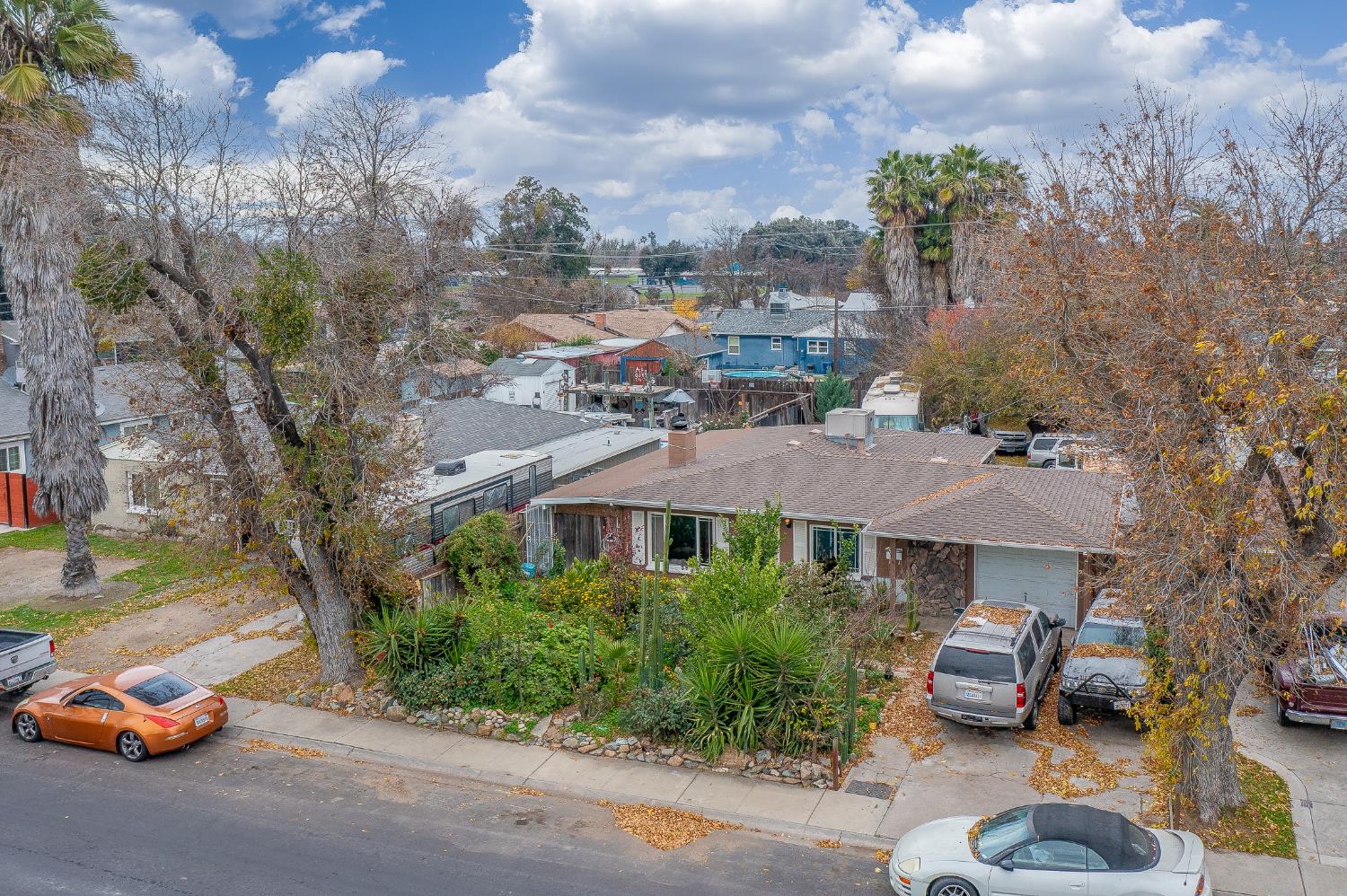 2309 Haddon Avenue Modesto, CA 95354 - Photo 2 of 15 a front view of a house with cars parked
