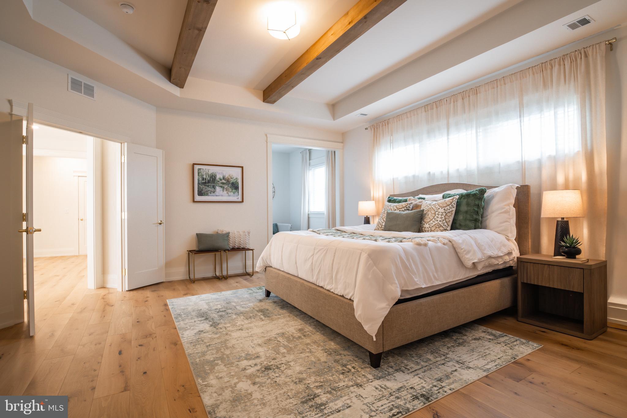 1 Strawberry Lane Lititz, PA 17543 - Photo 44 of 70 a bedroom with a bed and a large window