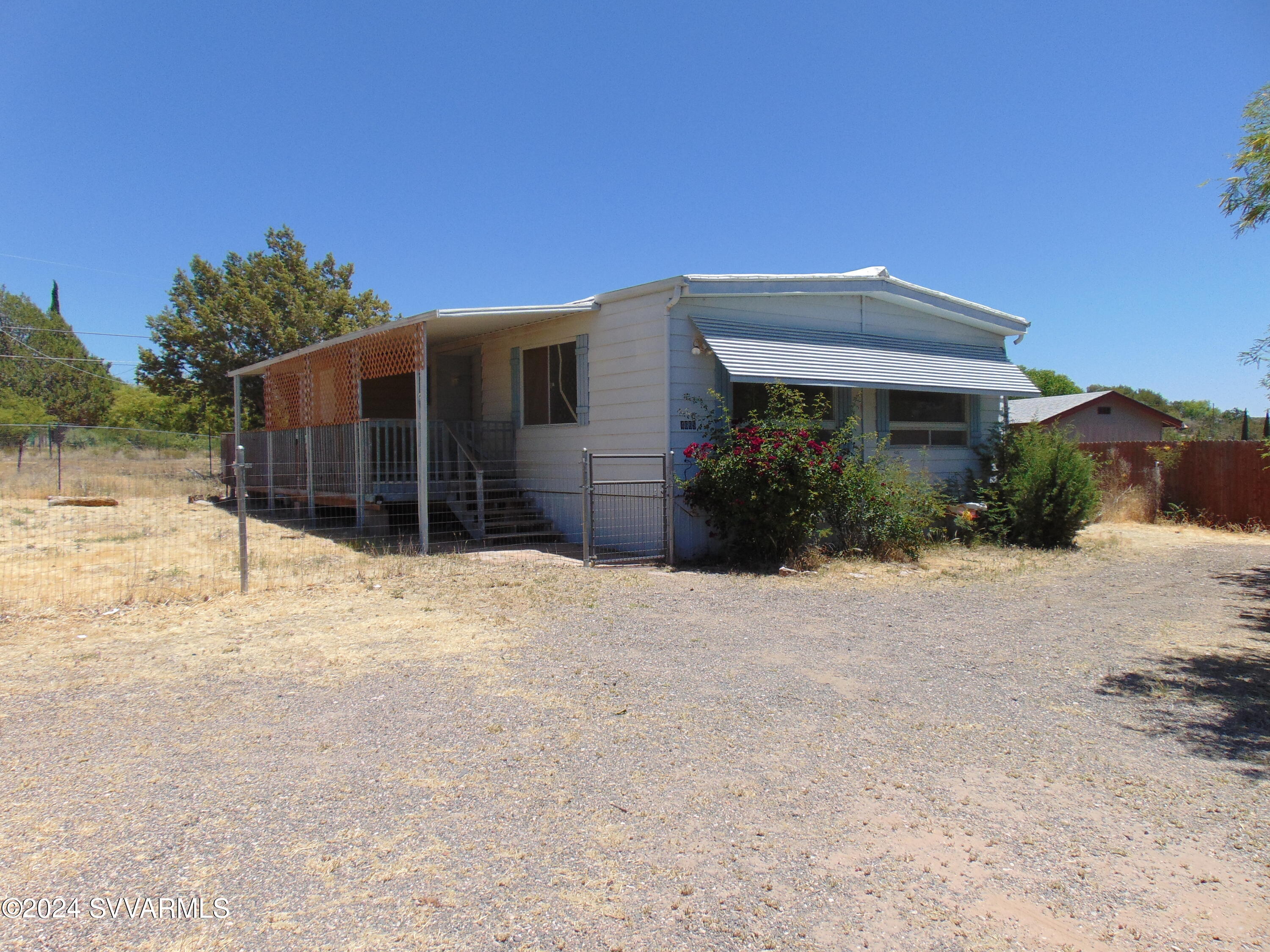4665 Quail Hollow Road Rimrock, AZ 86335 - Photo 1 of 21 a view of a house with a yard