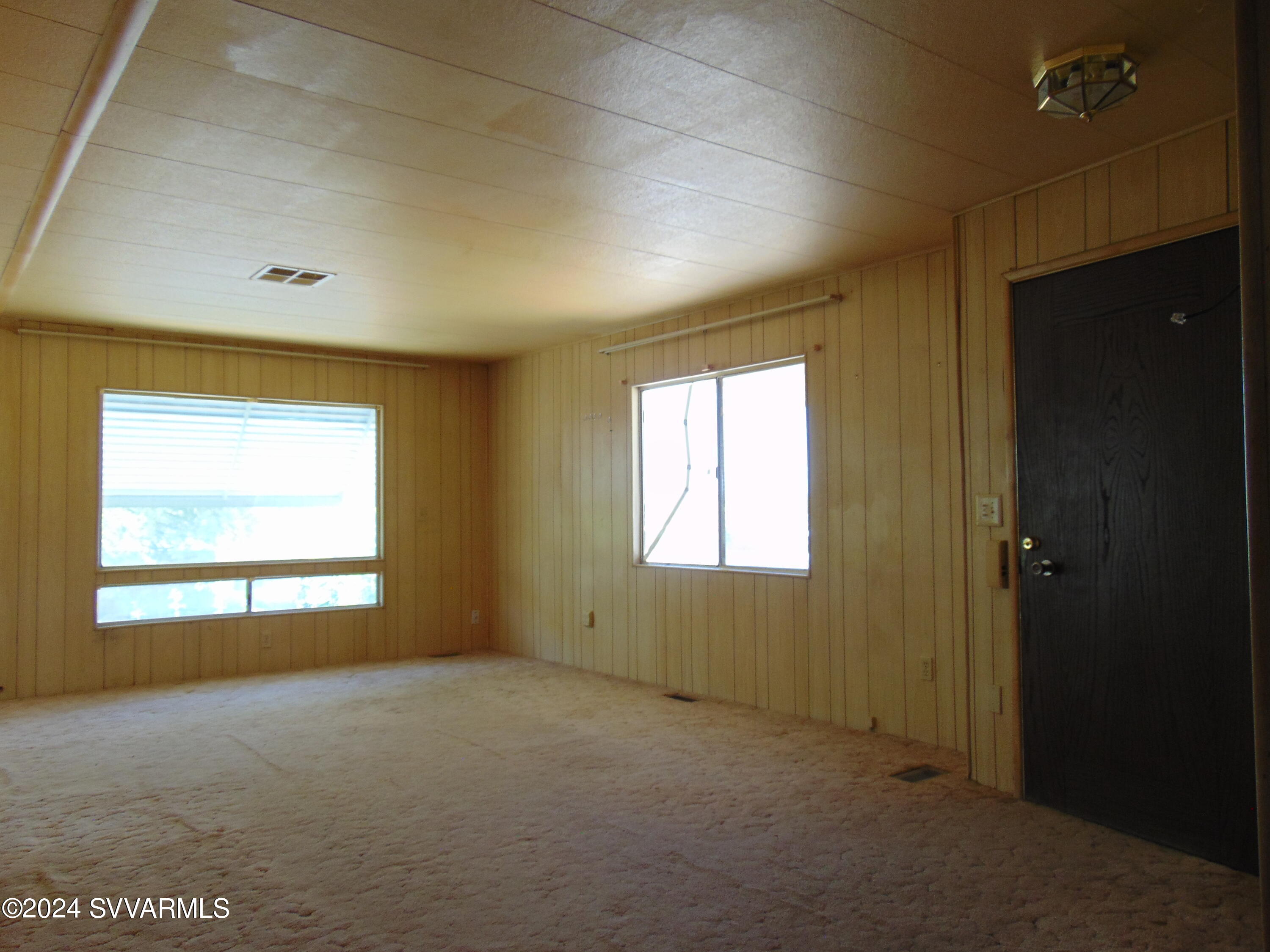 4665 Quail Hollow Road Rimrock, AZ 86335 - Photo 12 of 21 a view of an empty room with a window