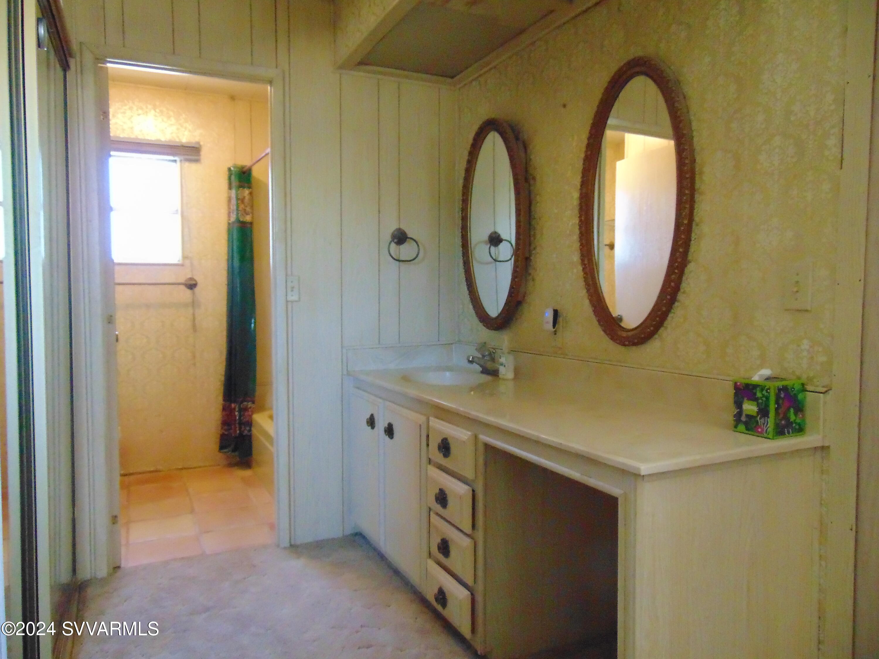 4665 Quail Hollow Road Rimrock, AZ 86335 - Photo 20 of 21 a bathroom with a sink and a mirror