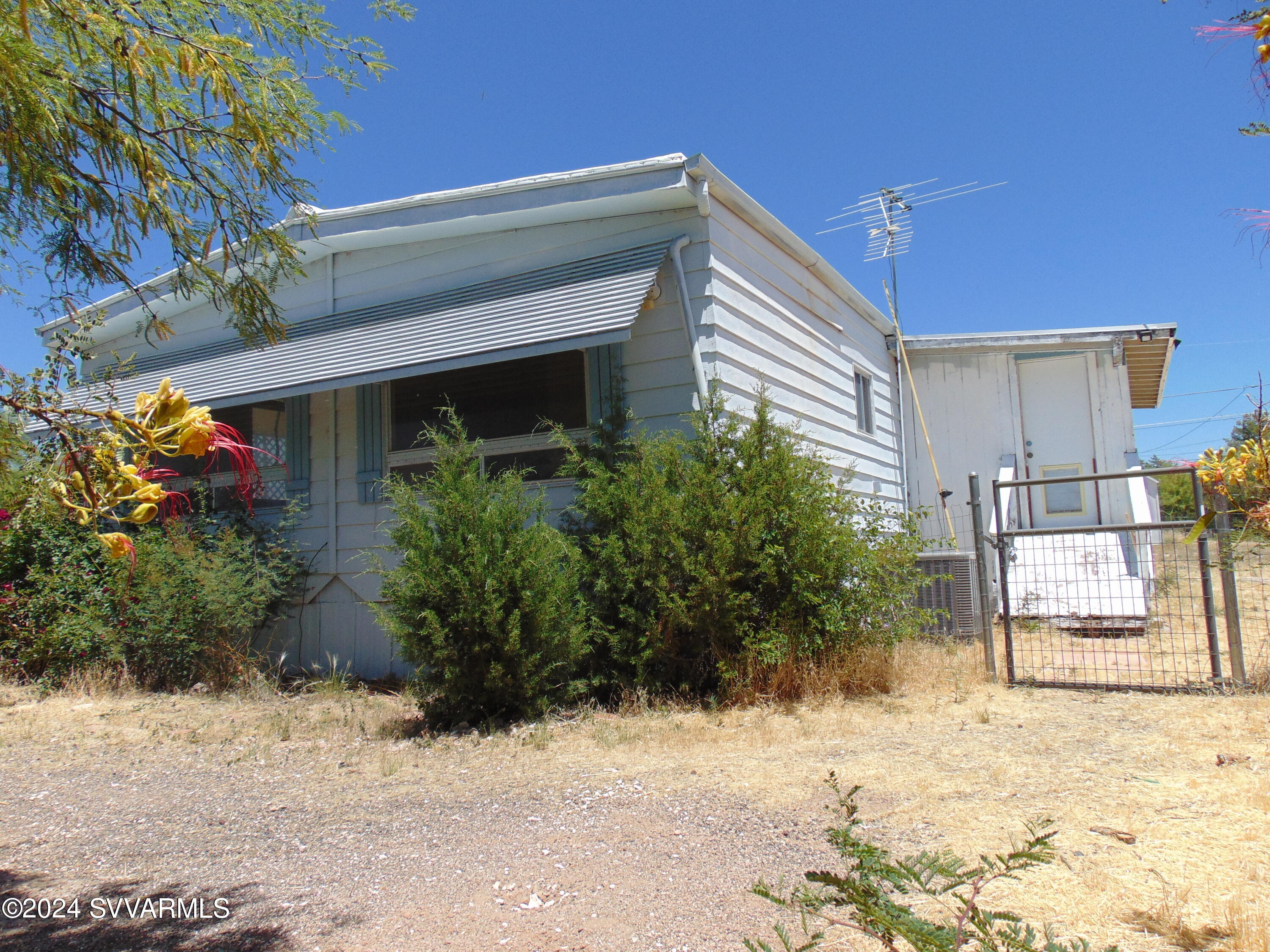 4665 Quail Hollow Road Rimrock, AZ 86335 - Photo 2 of 21 a view of a house with a yard
