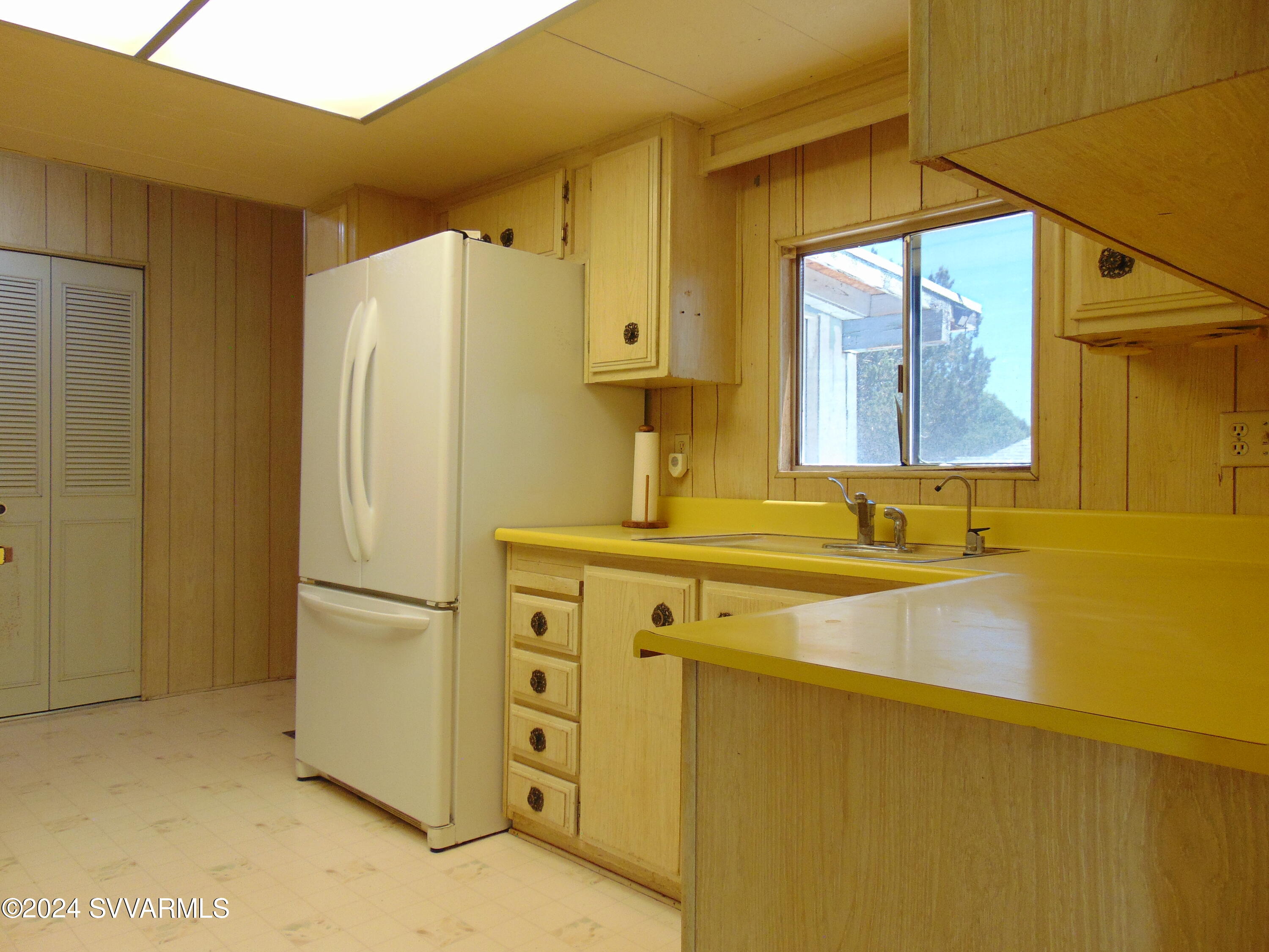 4665 Quail Hollow Road Rimrock, AZ 86335 - Photo 8 of 21 a bathroom with a double vanity sink and mirror