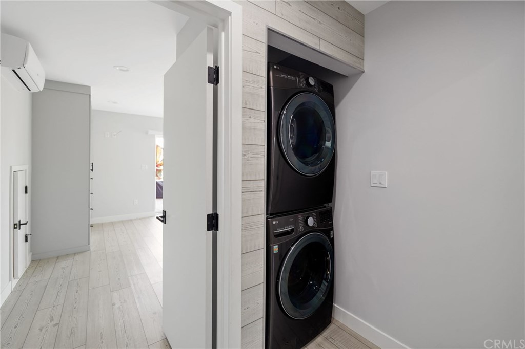 5 Clipper Road, Unit A Rancho Palos Verdes, CA 90275 - Photo 11 of 18 a view of a hallway with washer and dryer