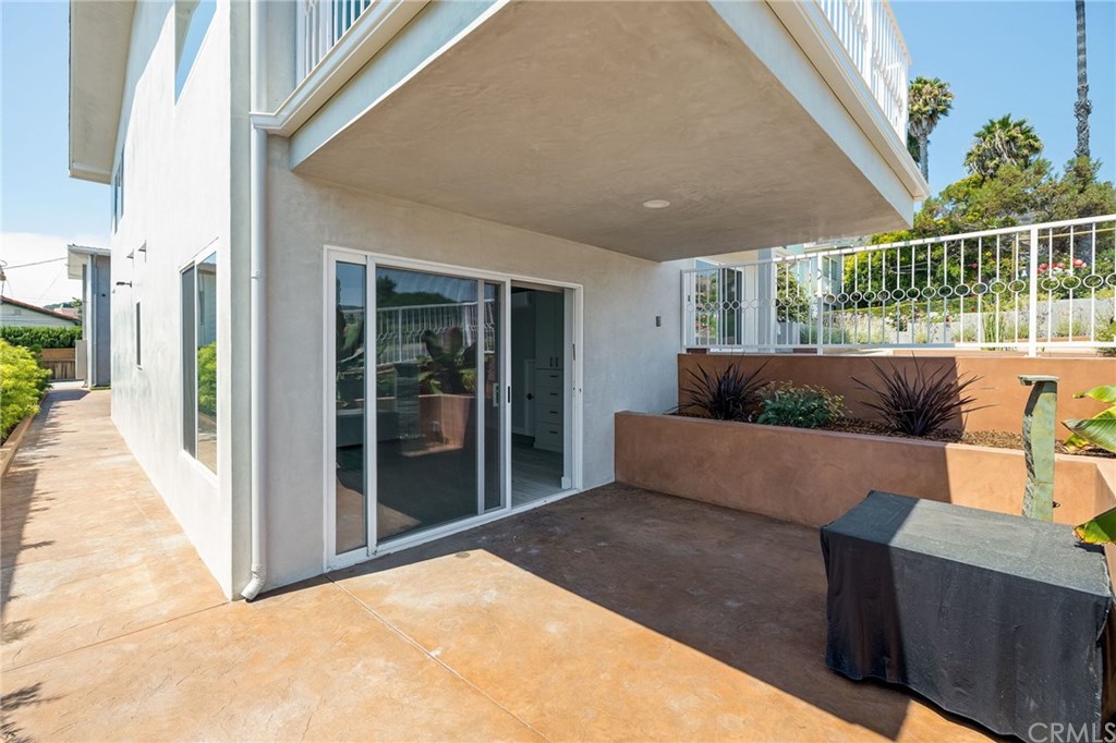 5 Clipper Road, Unit A Rancho Palos Verdes, CA 90275 - Photo 16 of 18 a balcony with furniture and a potted plant