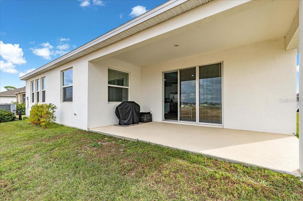 5851 Southwest 85th Place Ocala, FL 34476 - Photo 44 of 57 a view of a house with backyard and porch
