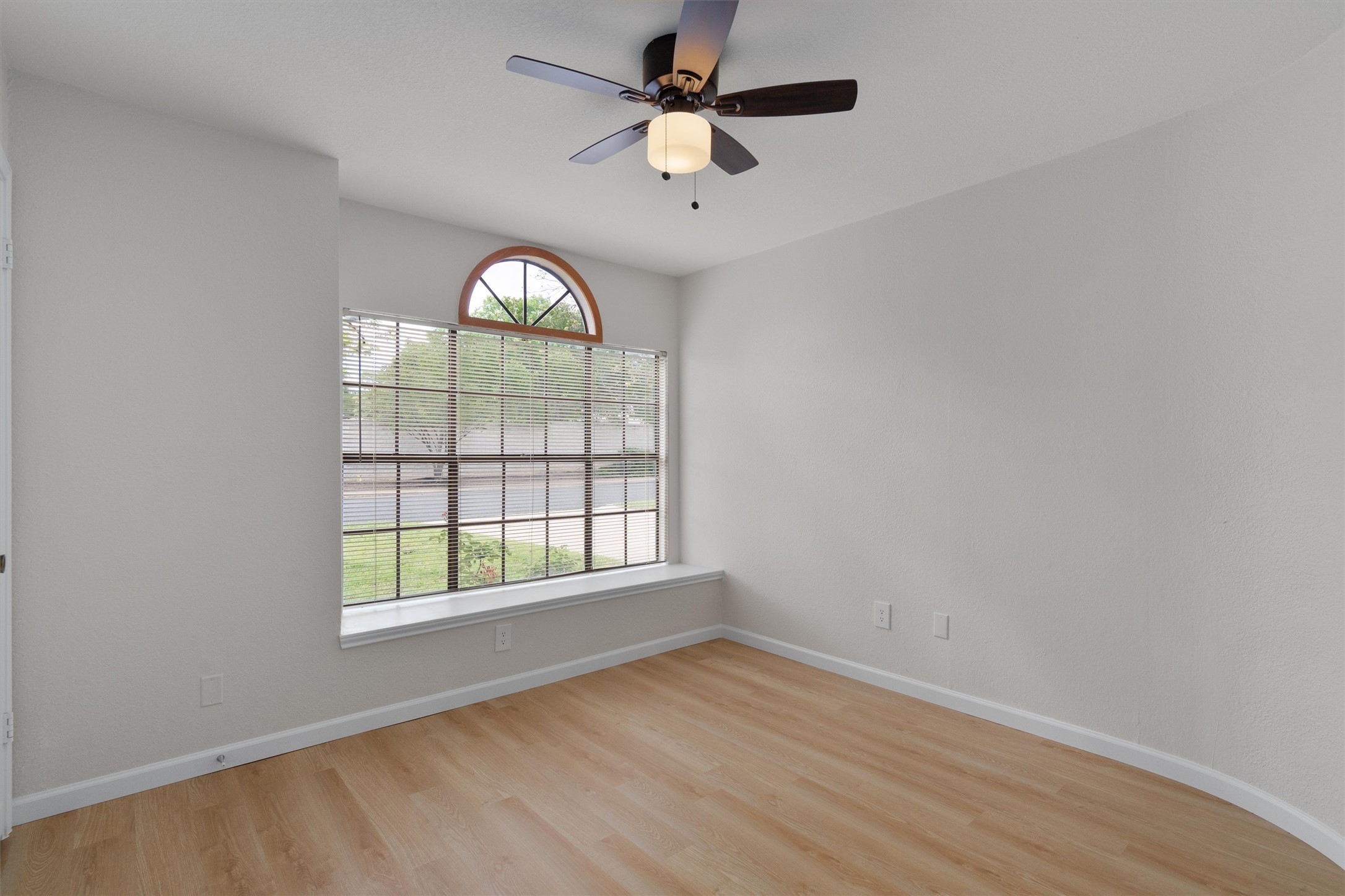1401 Plum Creek Road Cedar Park, TX 78613 - Photo 18 of 30 Unfurnished room with a ceiling fan and light wood finished floors