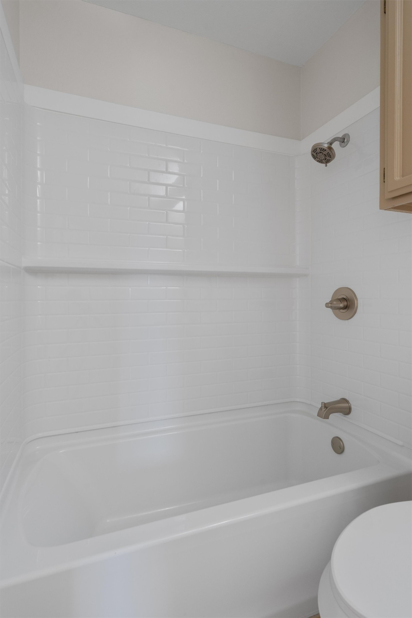 1401 Plum Creek Road Cedar Park, TX 78613 - Photo 23 of 30 Bathroom featuring bathtub / shower combination and toilet