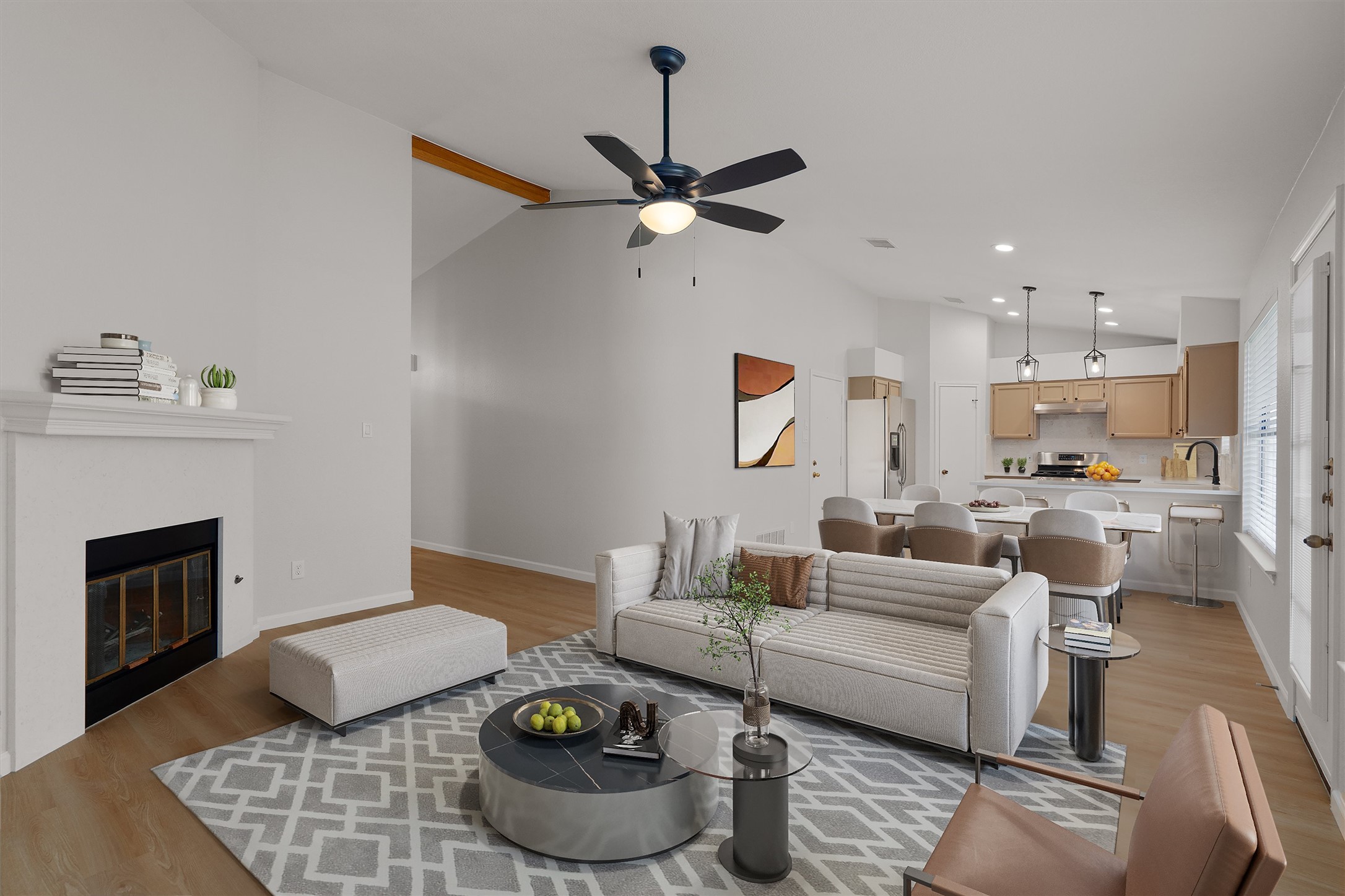 1401 Plum Creek Road Cedar Park, TX 78613 - Photo 5 of 30 Living area with lofted ceiling, a glass covered fireplace, light wood-type flooring, and a ceiling fan